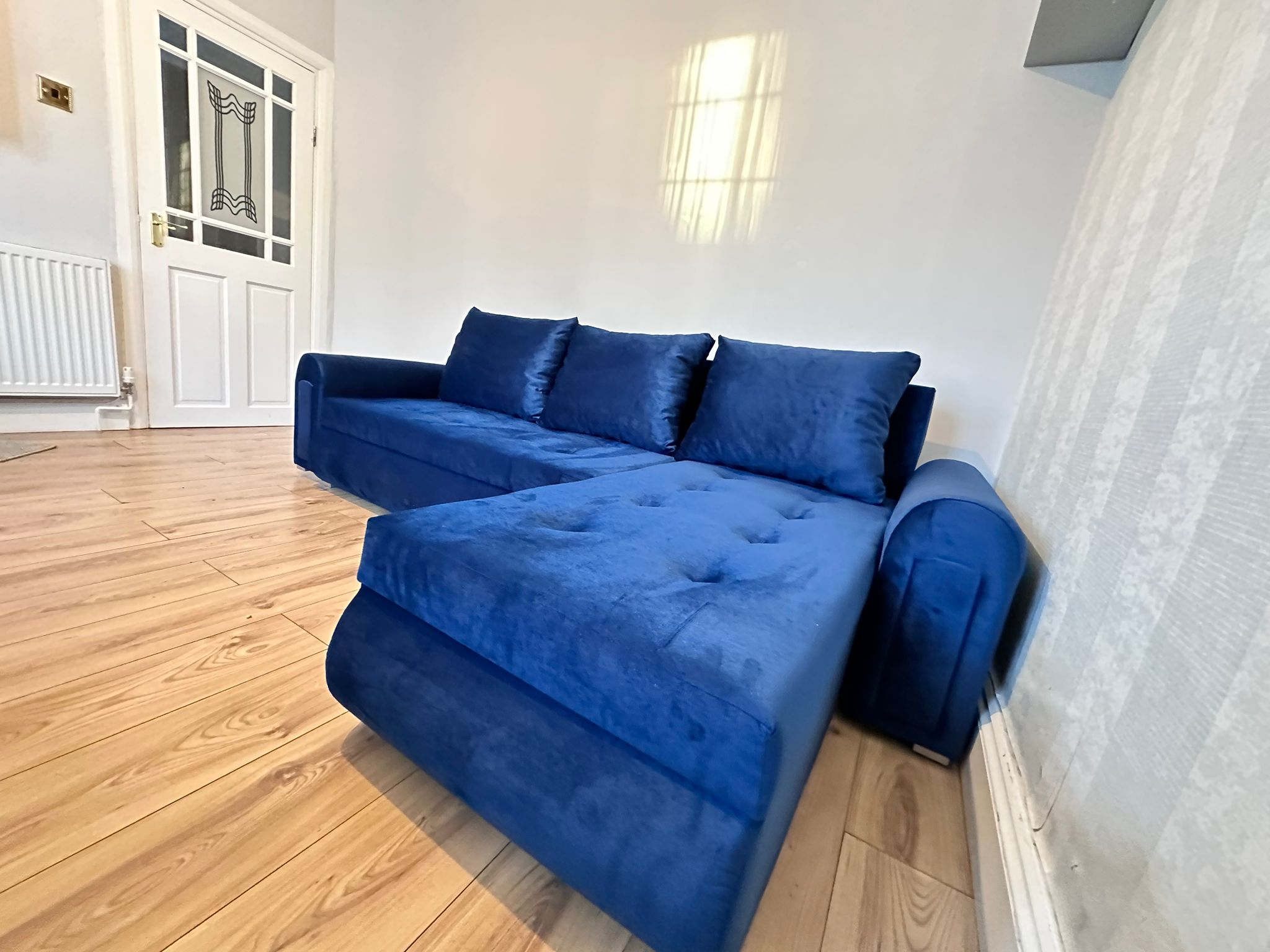 Berlin Blue velvet corner sofa bed with double storage - Image 4